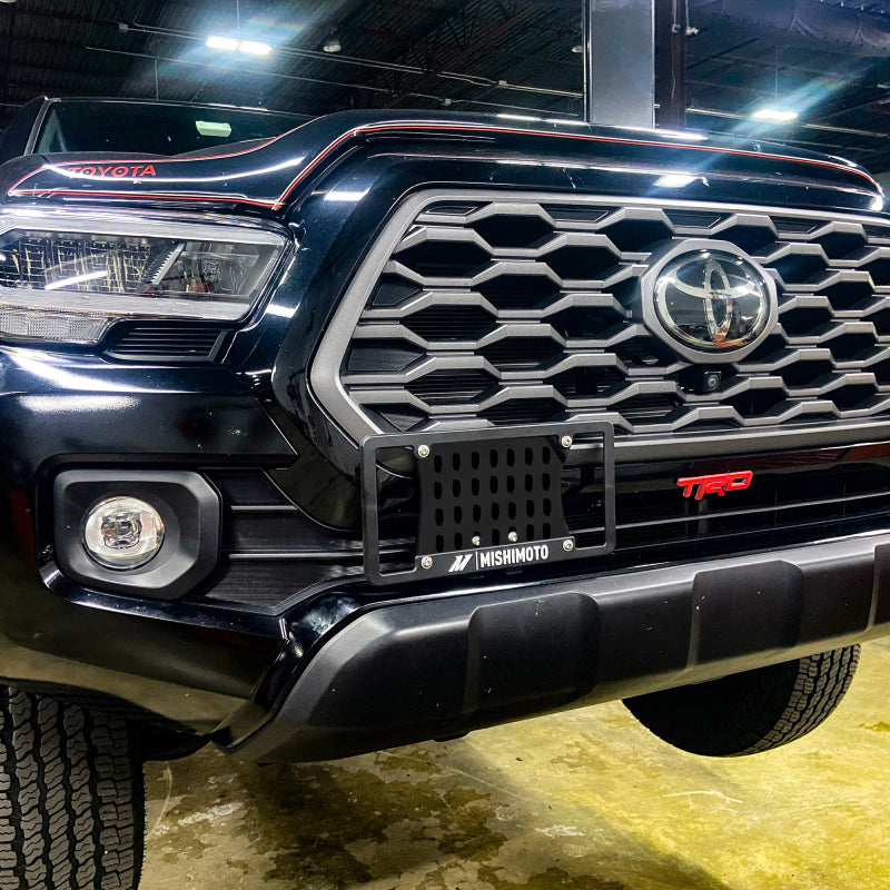 Load image into Gallery viewer, Mishimoto MMLP-TAC-16 MM License Plate Relocation
