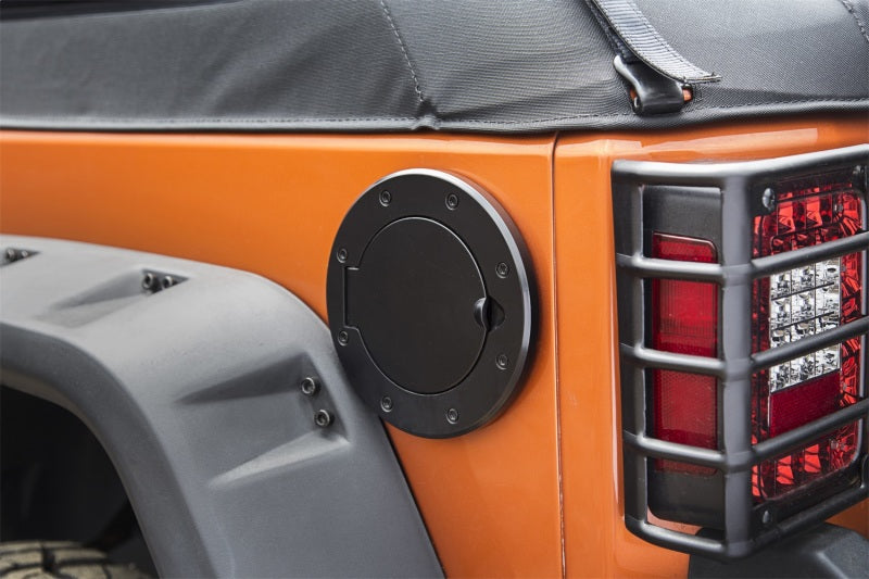 Load image into Gallery viewer, Rugged Ridge 11425.05 RUG Fuel Tank Caps / Doors
