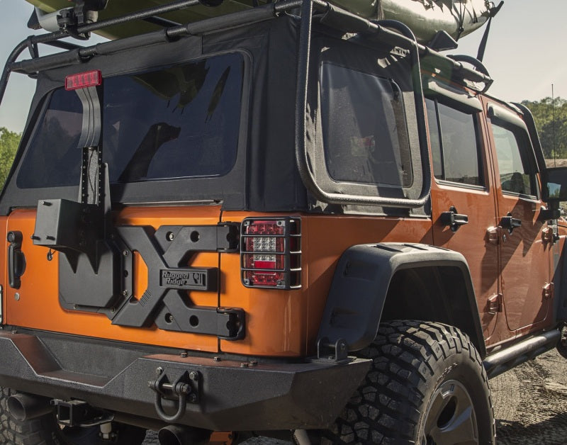 Load image into Gallery viewer, Rugged Ridge 11546.50 RUG Spare Tire Carriers
