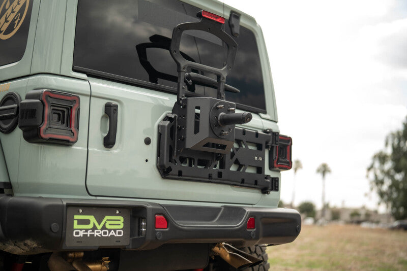 Load image into Gallery viewer, Dv8 Offroad TCJL-15 DVE Tire Carriers
