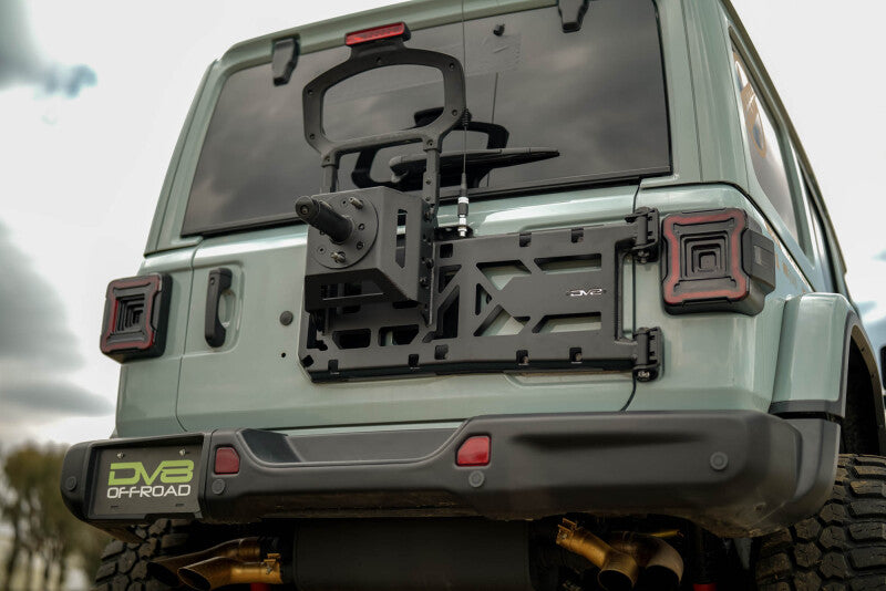 Load image into Gallery viewer, Dv8 Offroad TCJL-15 DVE Tire Carriers
