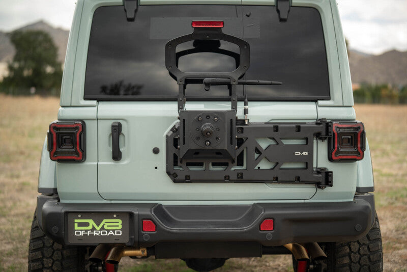 Load image into Gallery viewer, Dv8 Offroad TCJL-15 DVE Tire Carriers
