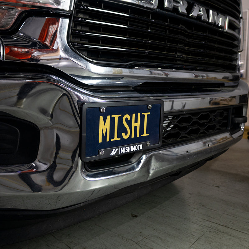 Load image into Gallery viewer, Mishimoto MMLP-RAM-19 MM License Plate Relocation

